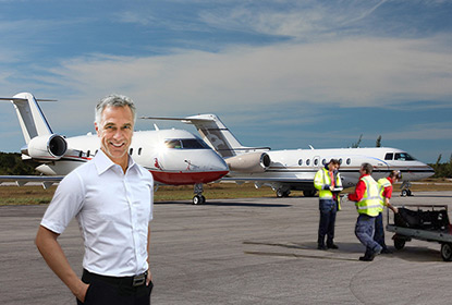 Satisfied Pilot customer on the ramp with CST Flight Services Agents helping with luggage and documents